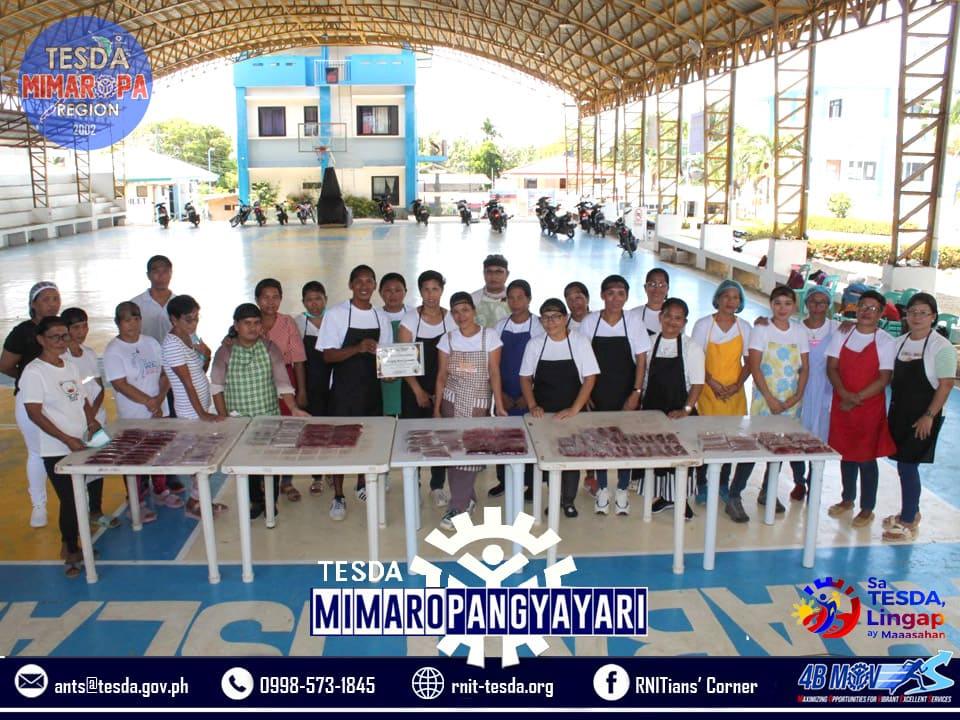 Group photo of the 25 training participants
